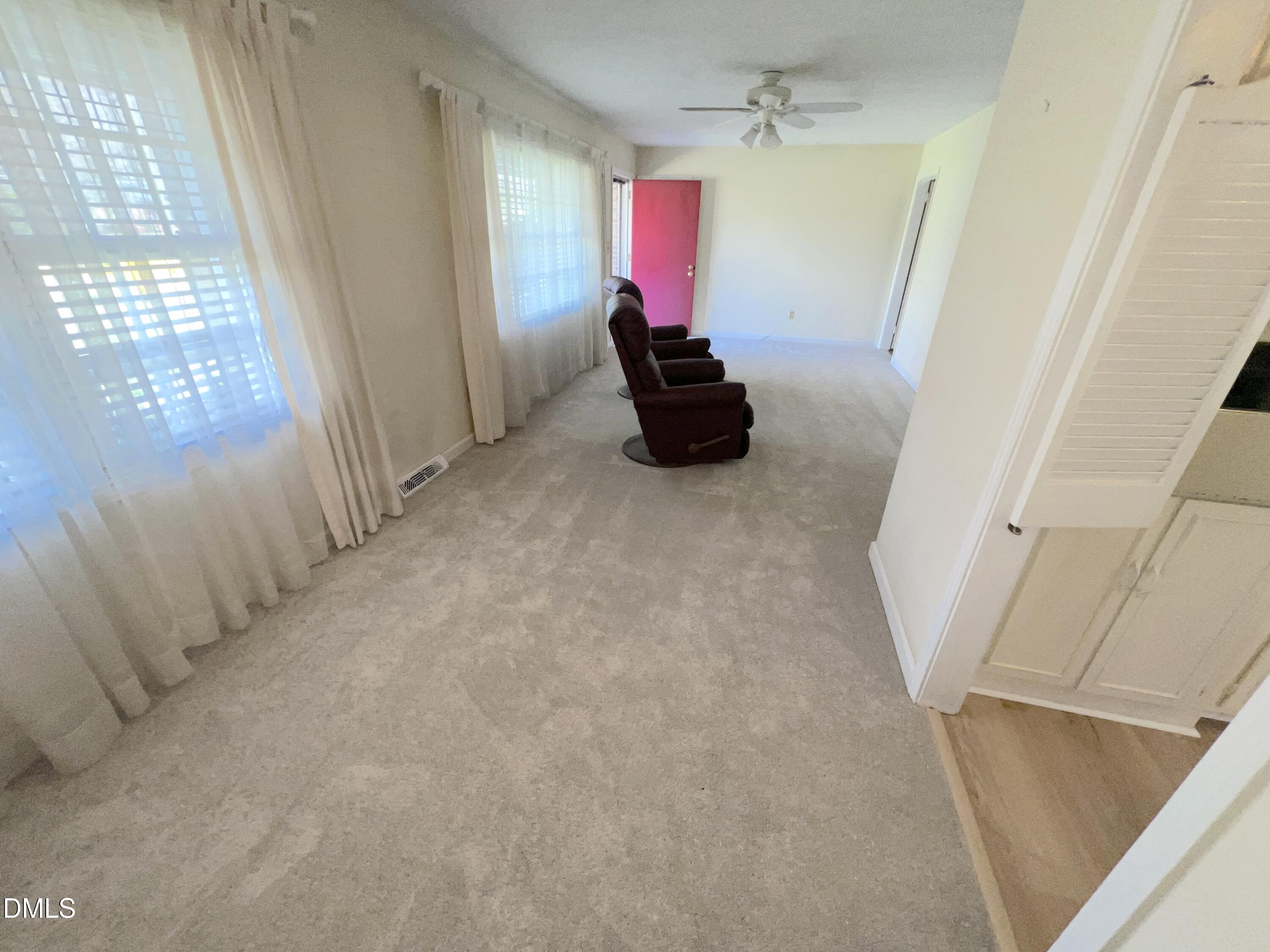 66 Allensville Road Roxboro, NC 27573 - Photo 26 of 52 a living room with furniture and a window