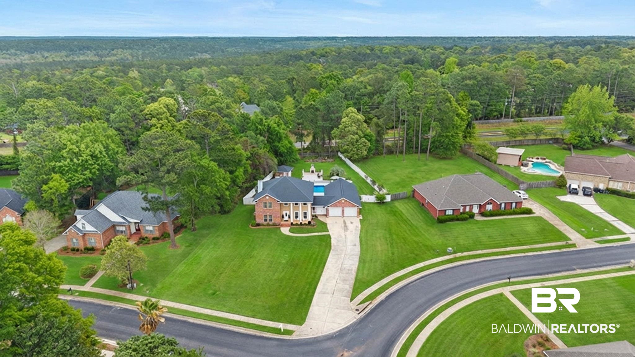 2 Speckle Trout Route Daphne, AL 36527 - Photo 5 of 61 Aerial view of residential area with a forest