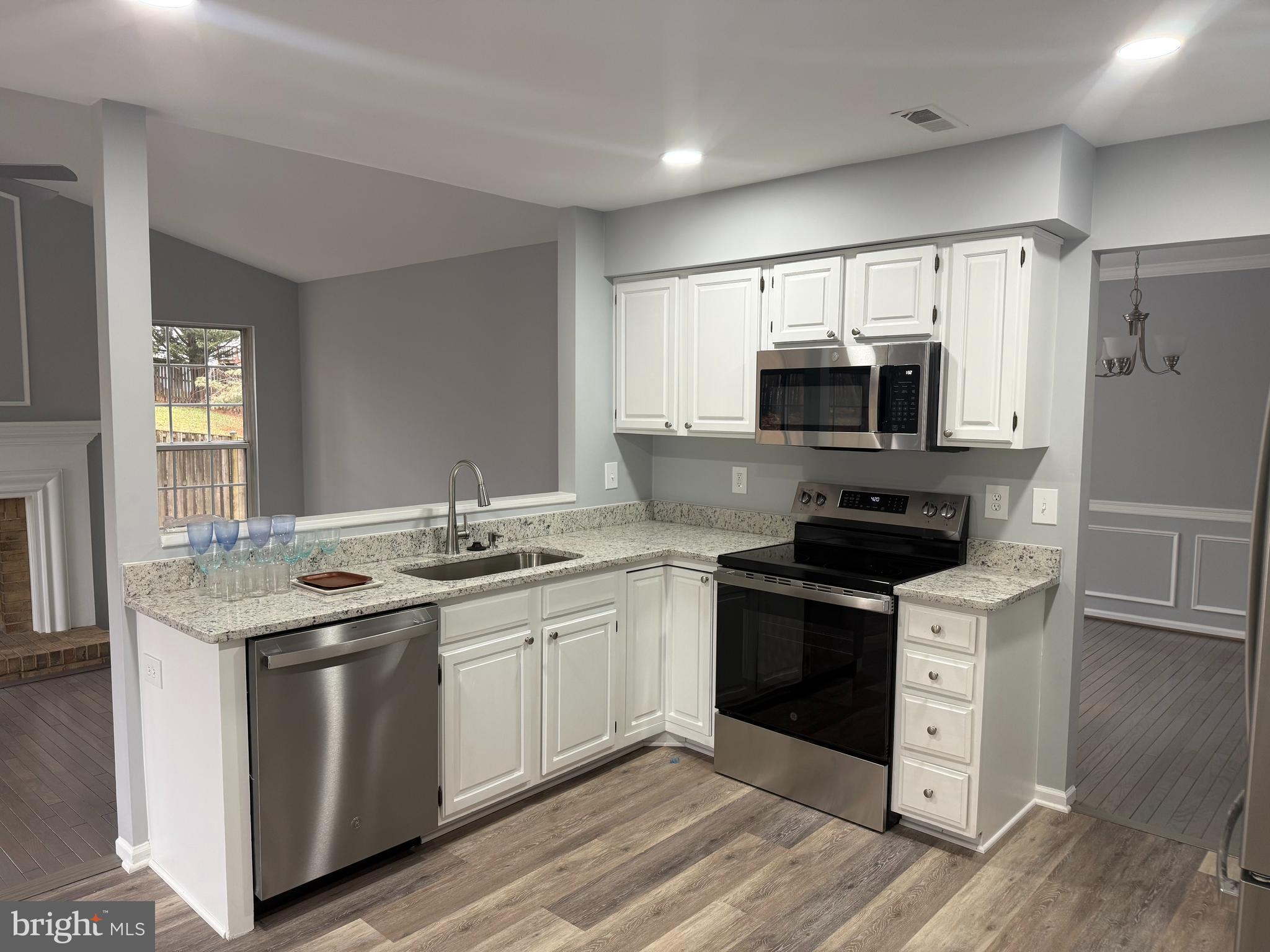12318 Valley High Road Herndon, VA 20170 - Photo 2 of 8 Renovated Kitchen with stainless steel appliances