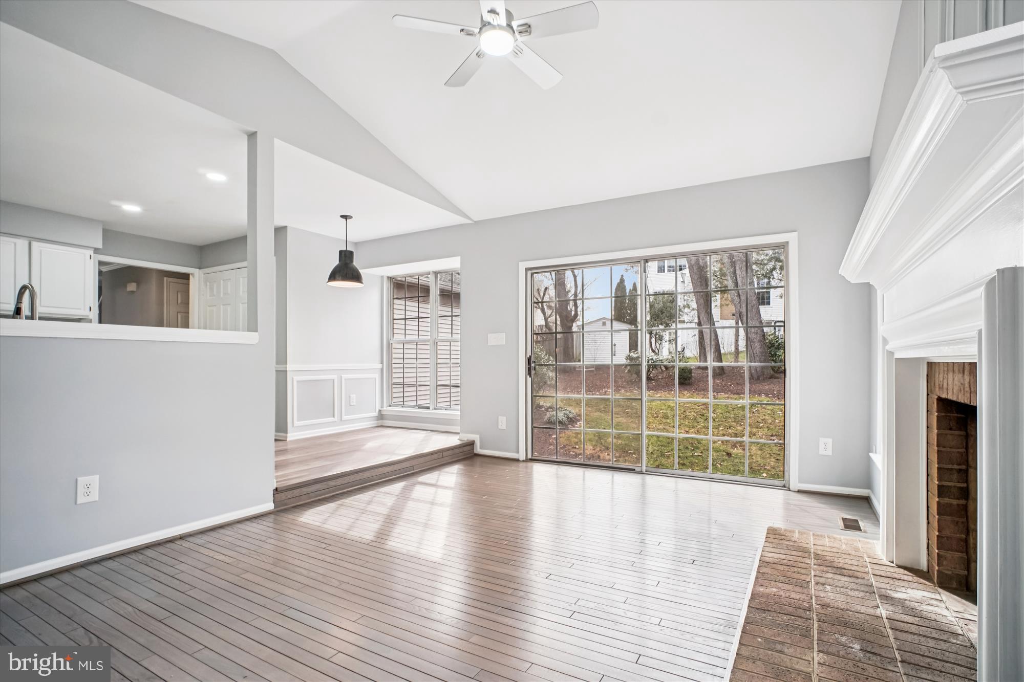 12318 Valley High Road Herndon, VA 20170 - Photo 23 of 56 an empty room with wooden floor and windows