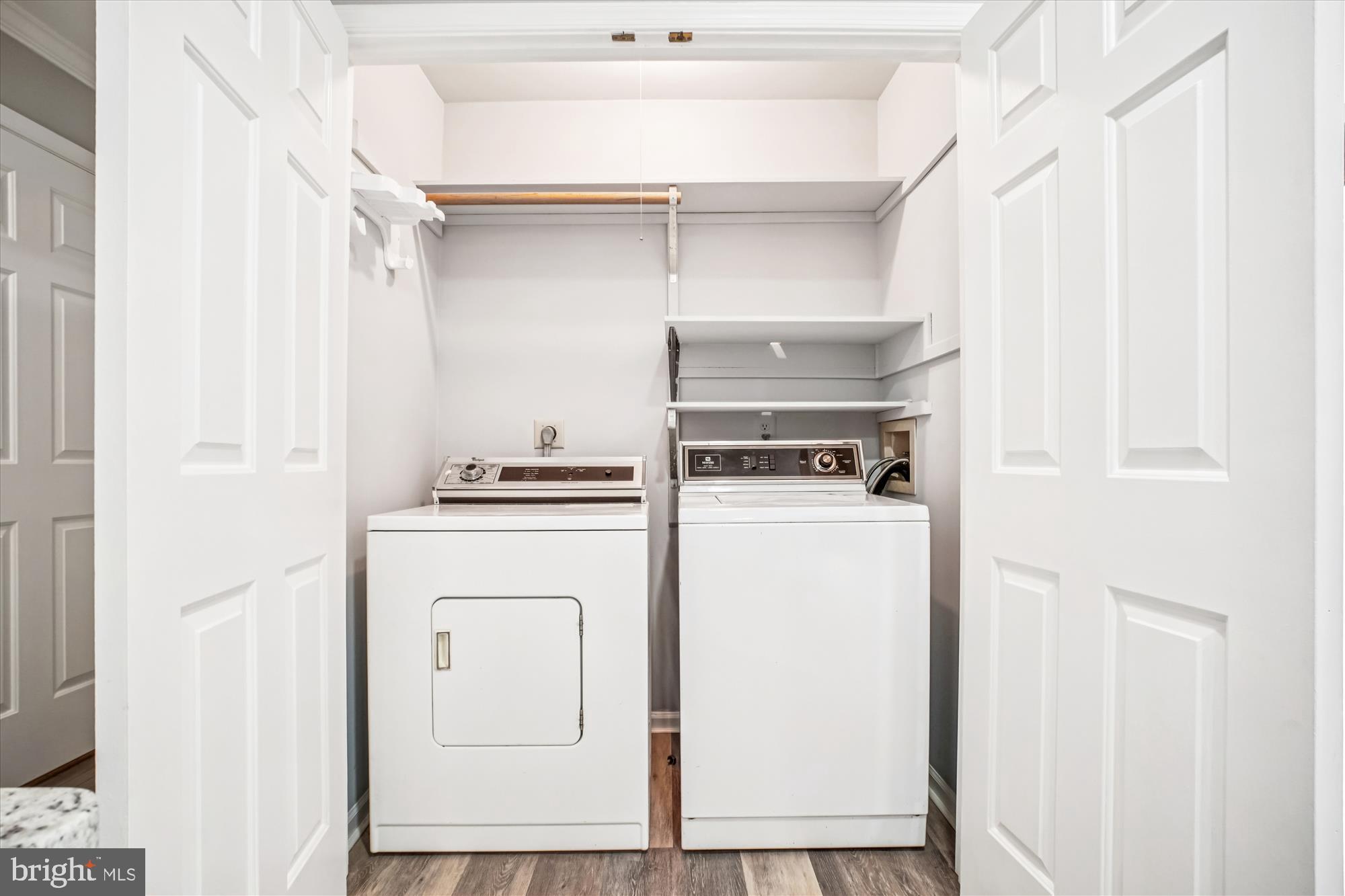 12318 Valley High Road Herndon, VA 20170 - Photo 27 of 56 a utility room with closet dryer and washer