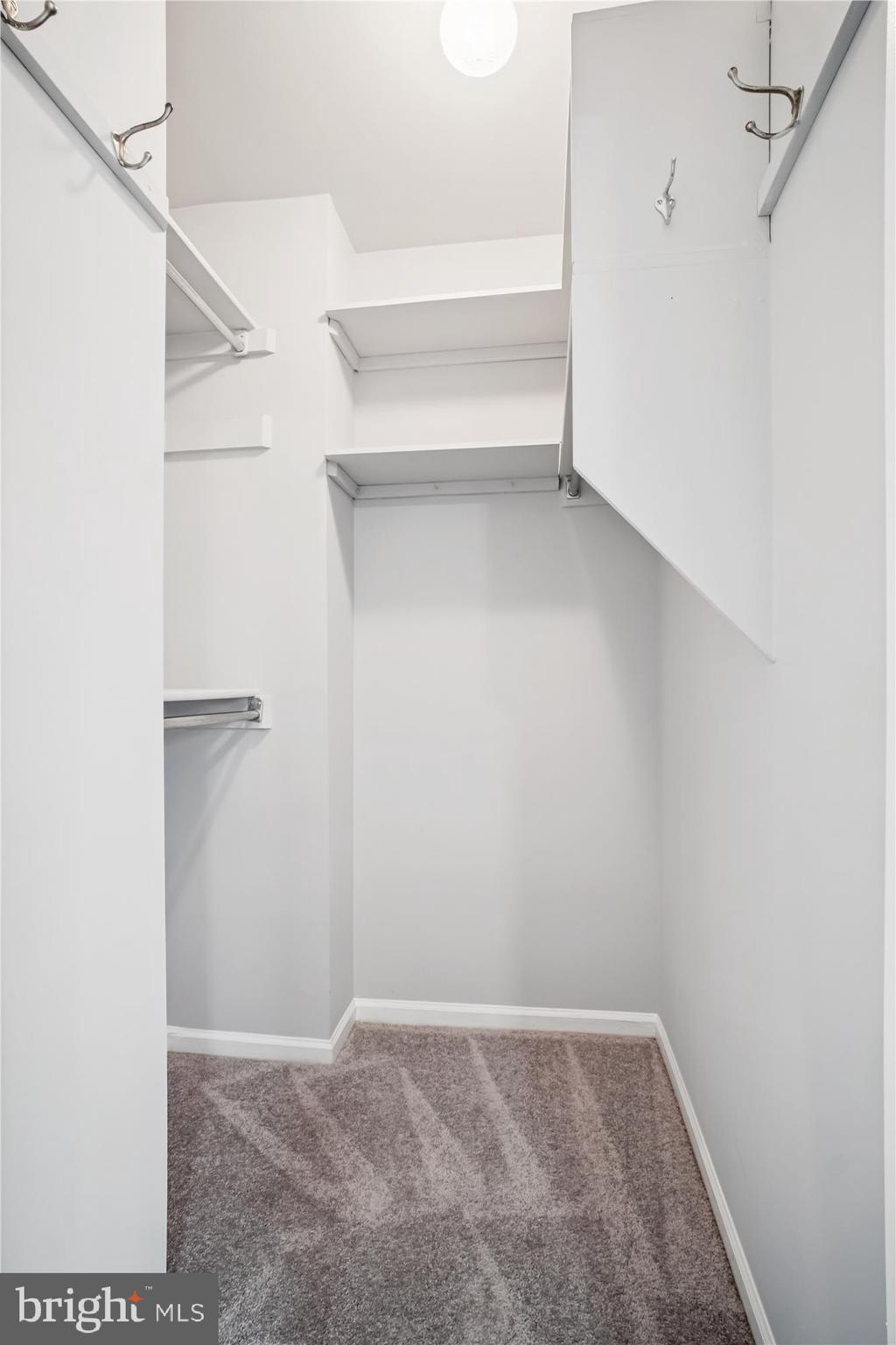 12318 Valley High Road Herndon, VA 20170 - Photo 32 of 56 a view of an empty walk in closet