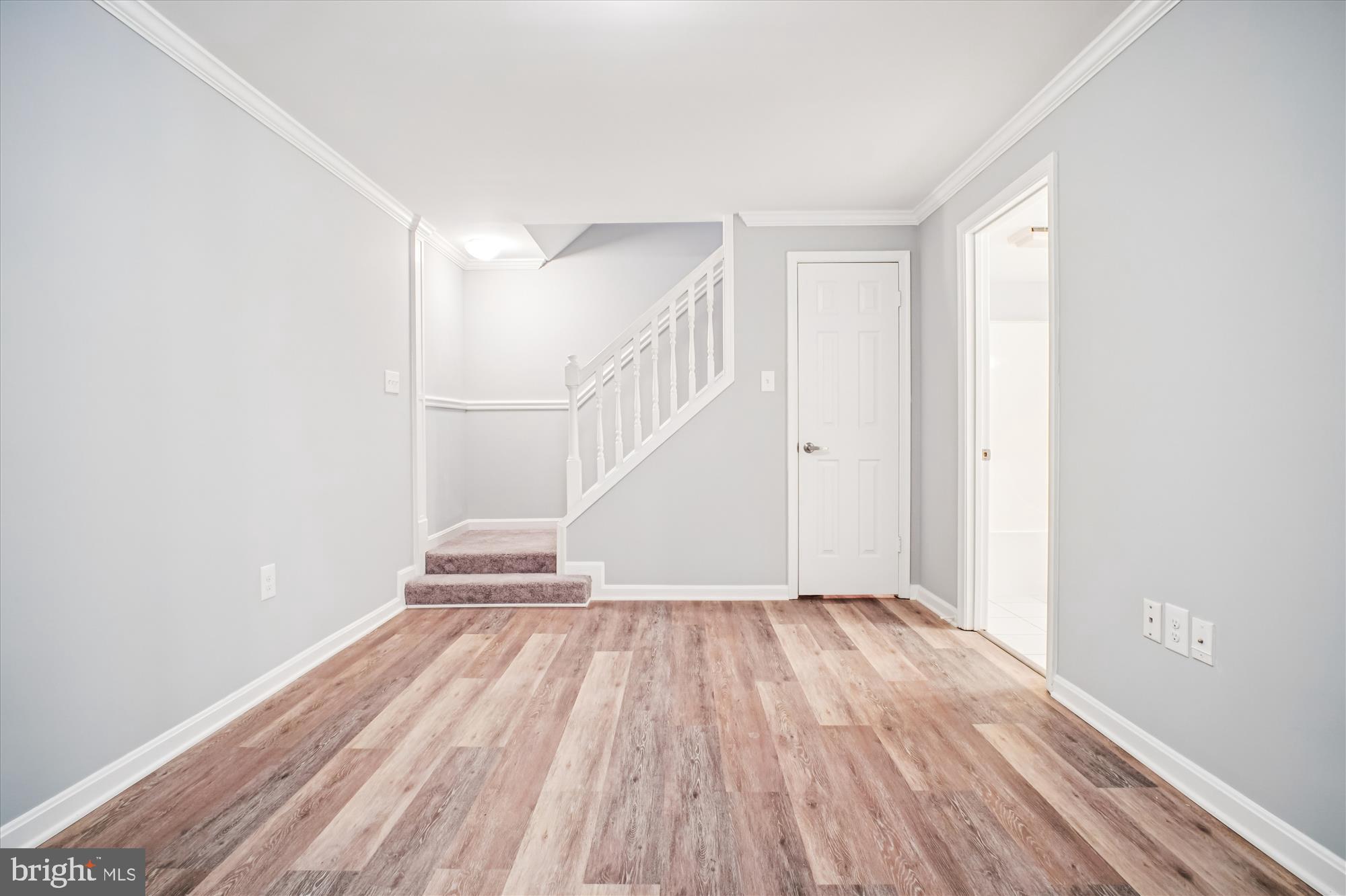 12318 Valley High Road Herndon, VA 20170 - Photo 39 of 56 a view of entryway with wooden floor
