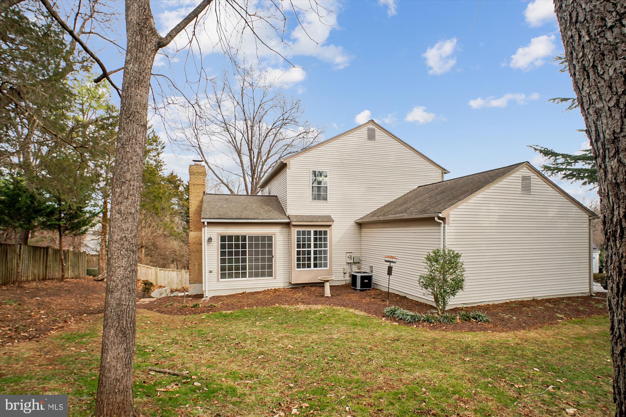 12318 Valley High Road Herndon, VA 20170 - Photo 54 of 56 a view of a house with a yard