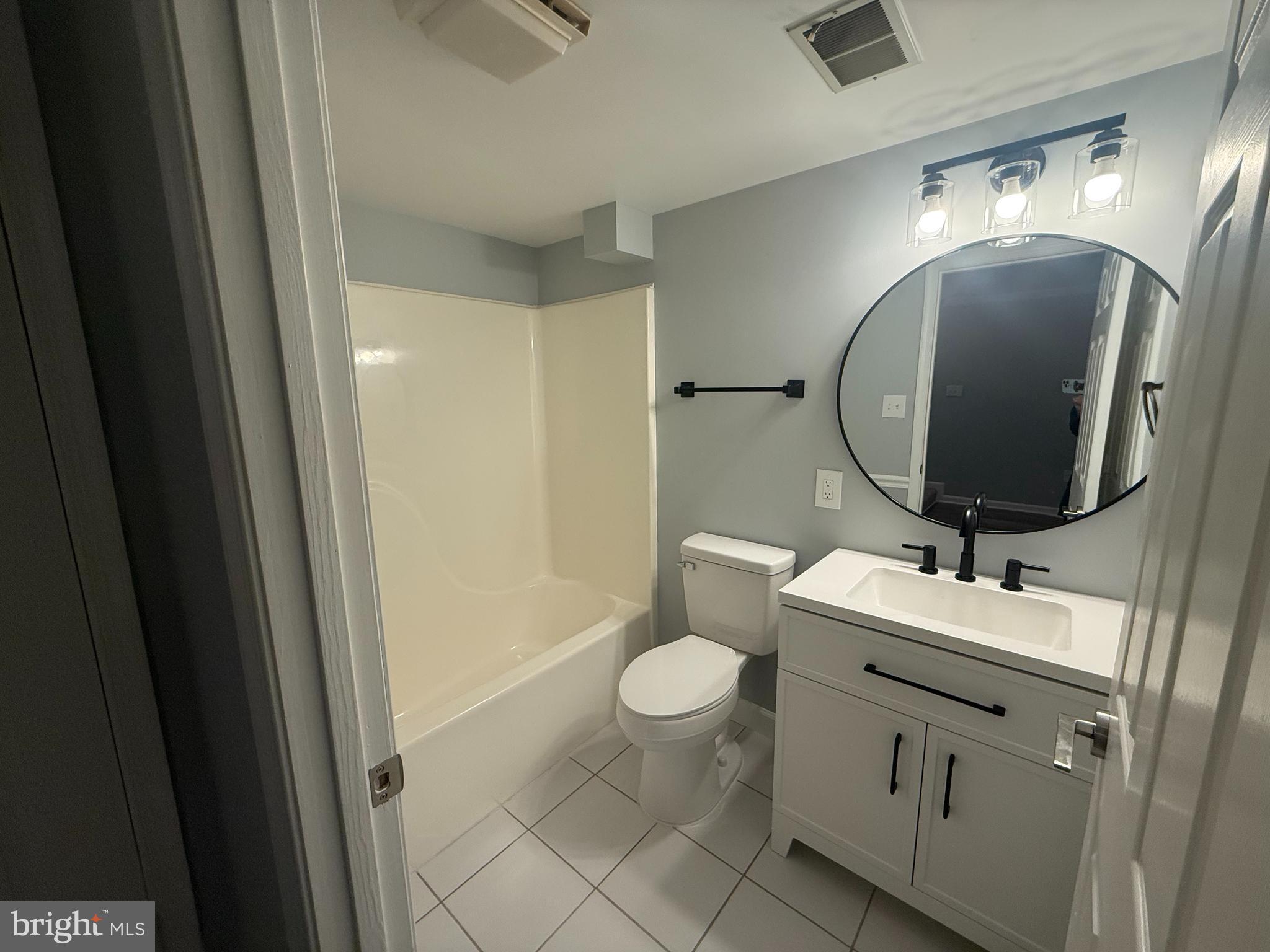 12318 Valley High Road Herndon, VA 20170 - Photo 8 of 8 Updated lower level full bath