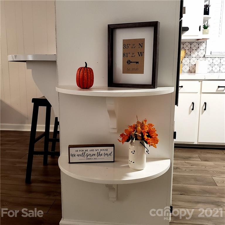 502 Roy Eaker Road Cherryville, NC 28021 - Photo 6 of 22 a view of a vase of flowers on a dining table