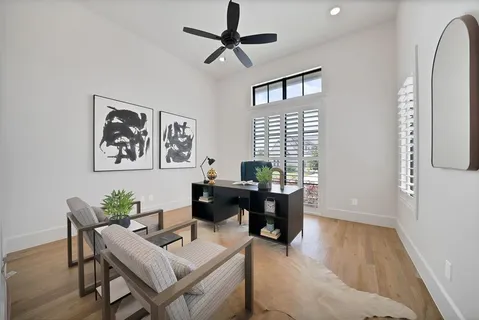 a work room with furniture and window