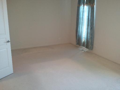 2482 Emily Lane Elgin, IL 60124 - Photo 9 of 10 a view of an empty room with a mirror