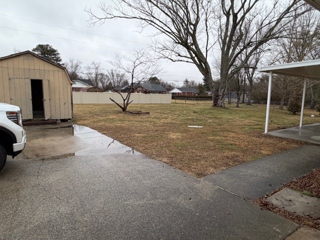 607 Adams Street Manchester, TN 37355 - Photo 13 of 14 a view of a yard with a house