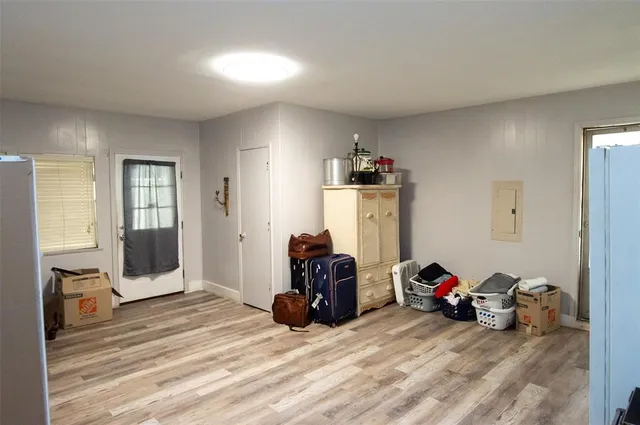 a view of a livingroom with furniture and toys