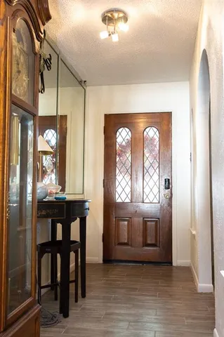 a view of a livingroom with furniture and window