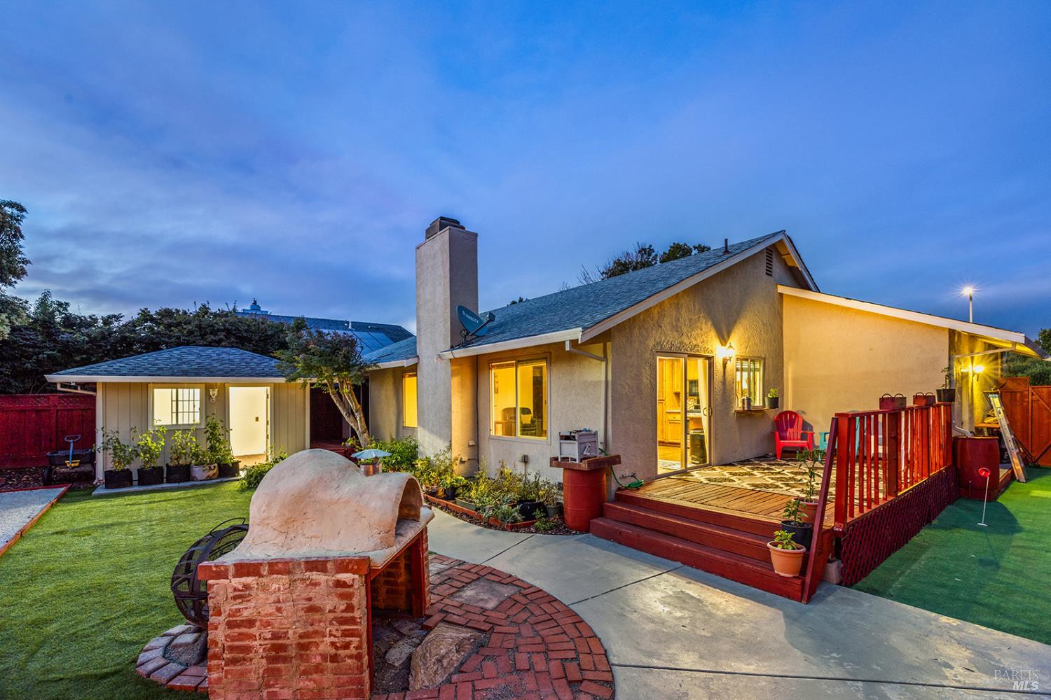 a outdoor living space with furniture and garden view