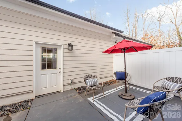 a front view of a brick building with many windows