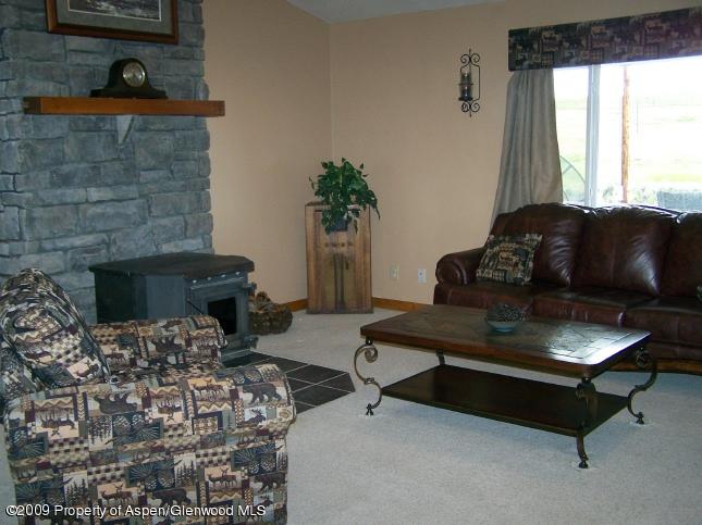 855 County Road, Unit 78 Craig, CO 81625 - Photo 7 of 20 Living room showing pellet stove