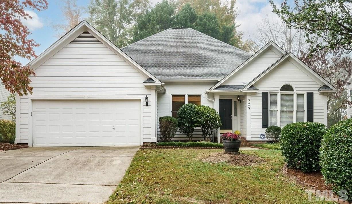 a view of house with yard and entertaining space