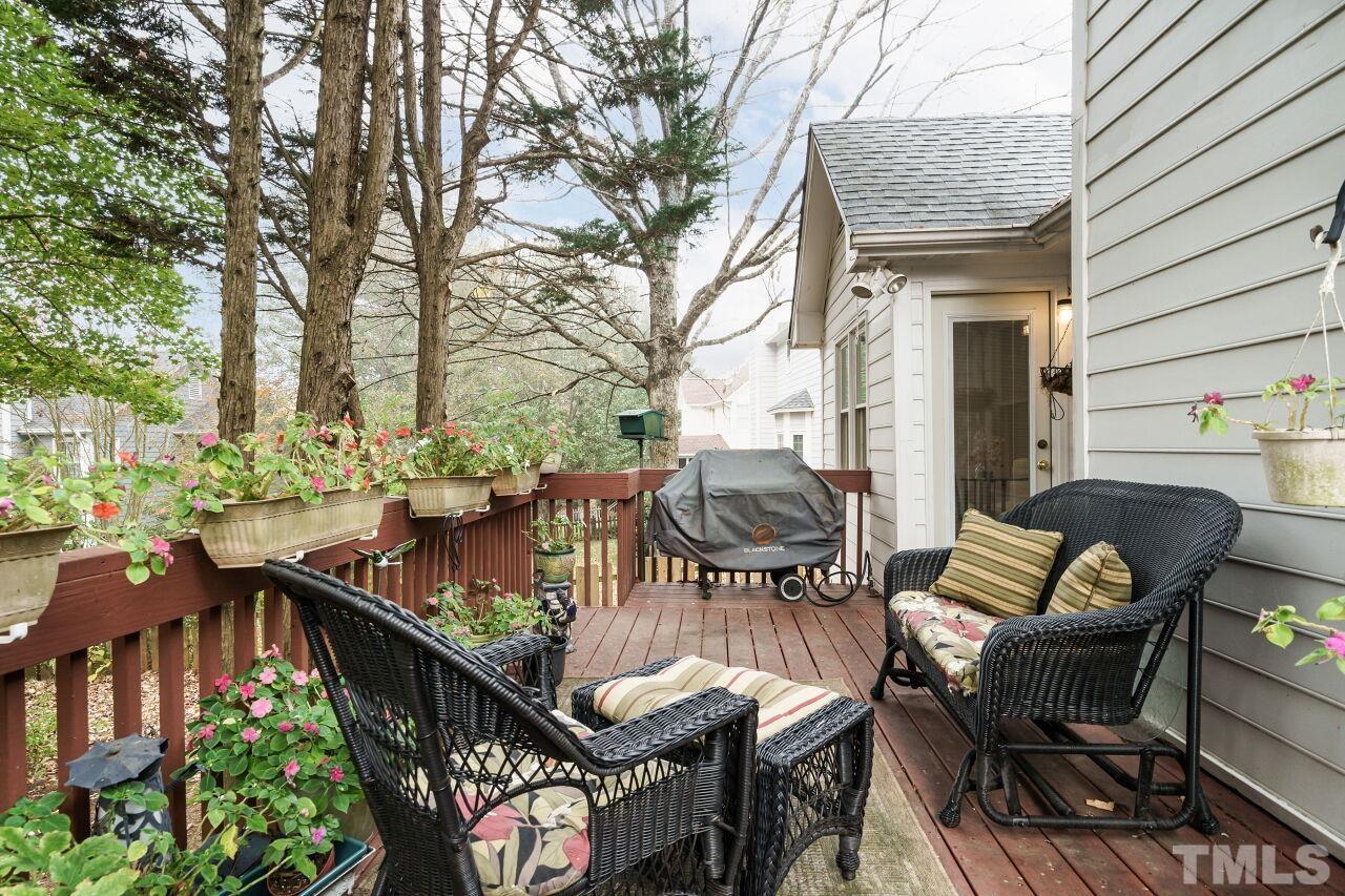 5305 Calverton Drive Raleigh, NC 27613 - Photo 27 of 34 a view of a patio with iron fence