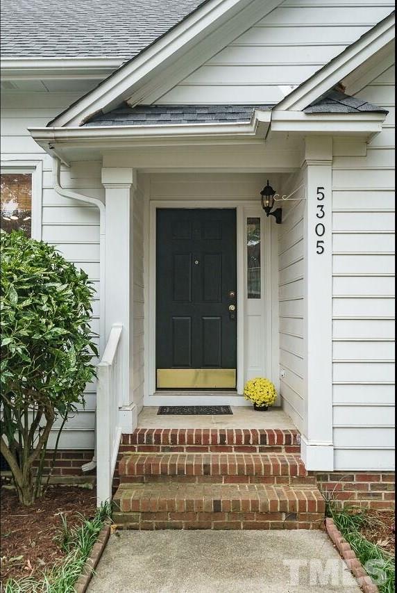 5305 Calverton Drive Raleigh, NC 27613 - Photo 32 of 34 a front view of a house