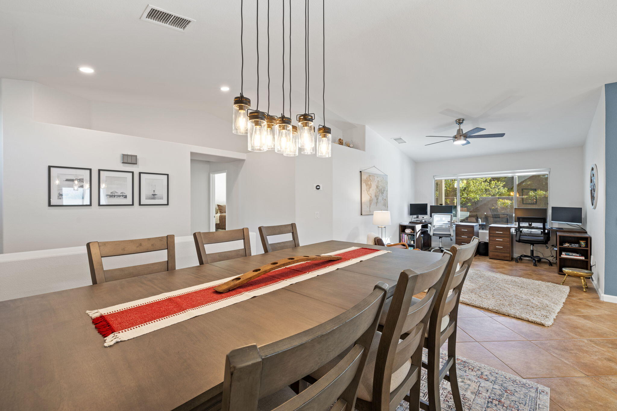 81107 Portola Circle Indio, CA 92201 - Photo 14 of 40 a view of a dining room with furniture and a chandelier