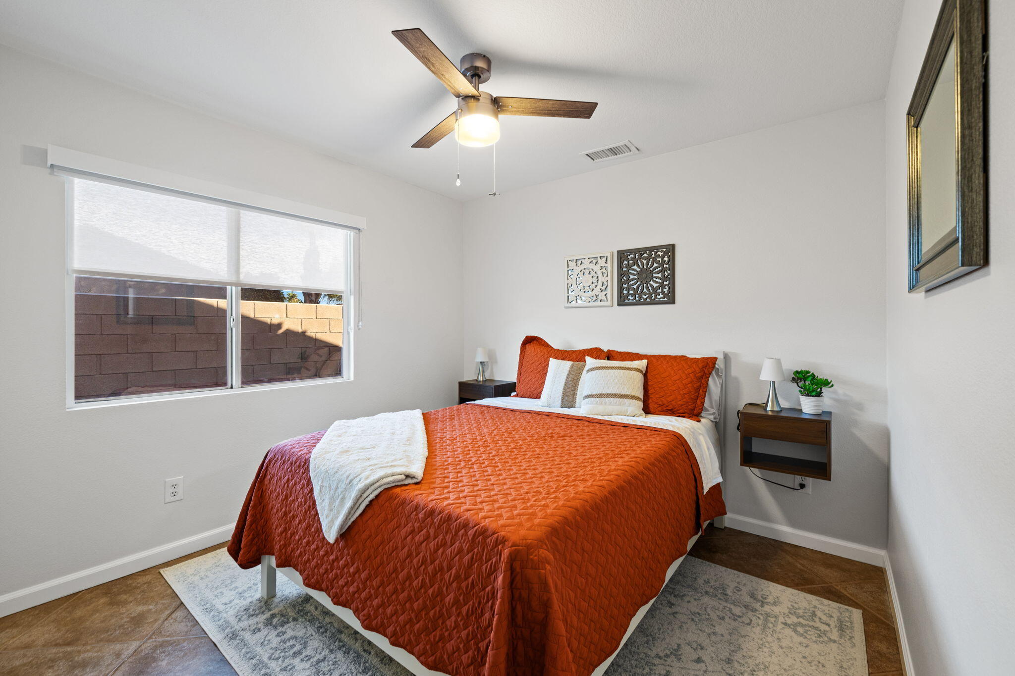 81107 Portola Circle Indio, CA 92201 - Photo 21 of 40 a bedroom with bed and window