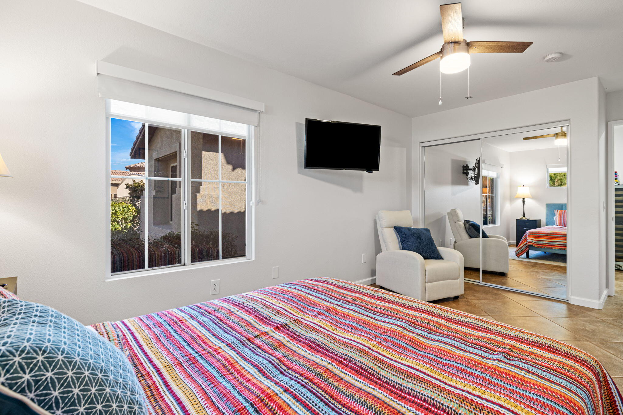 81107 Portola Circle Indio, CA 92201 - Photo 26 of 40 a bedroom with a bed furniture and a window