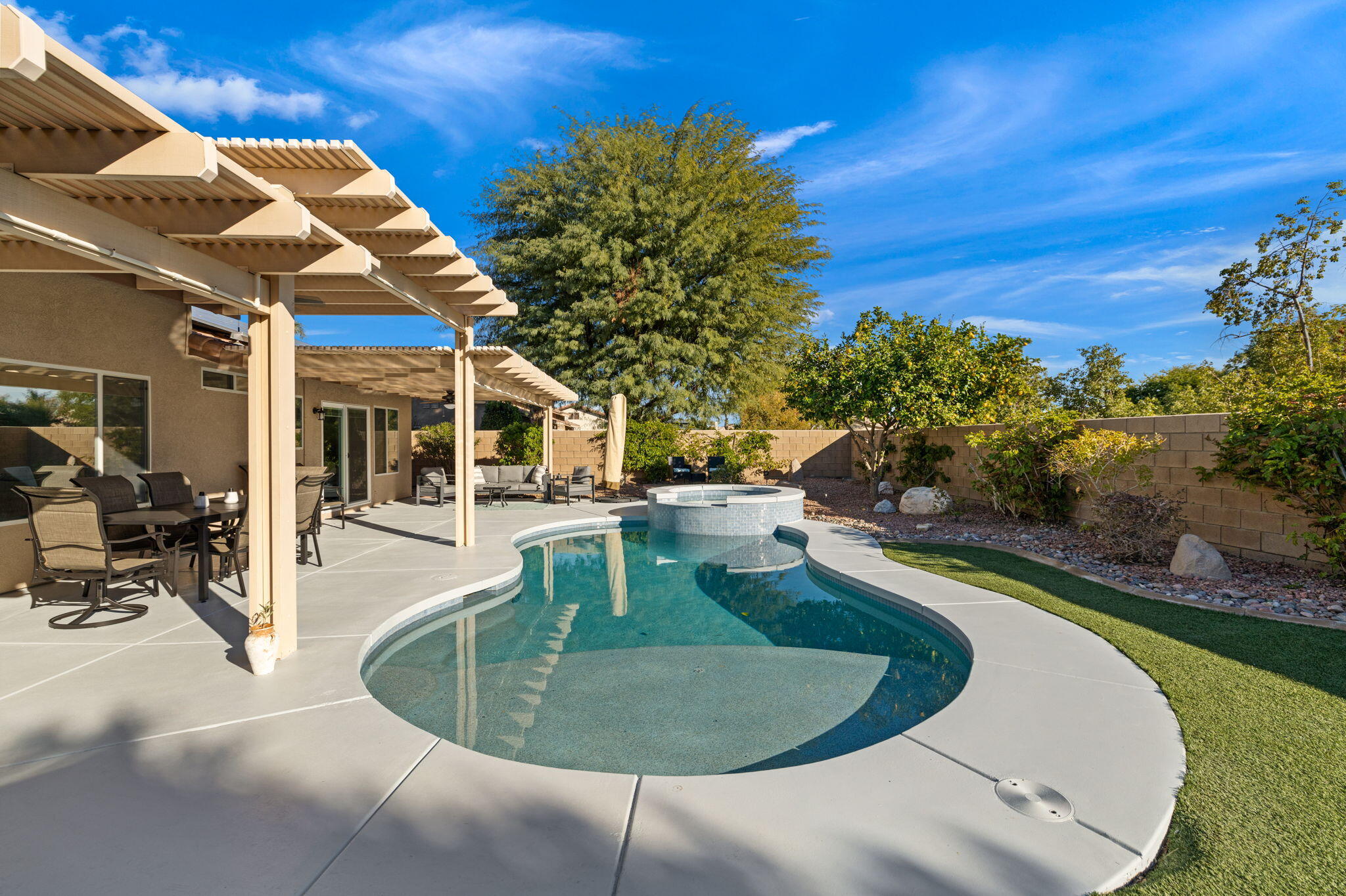 81107 Portola Circle Indio, CA 92201 - Photo 30 of 40 a view of a house with swimming pool