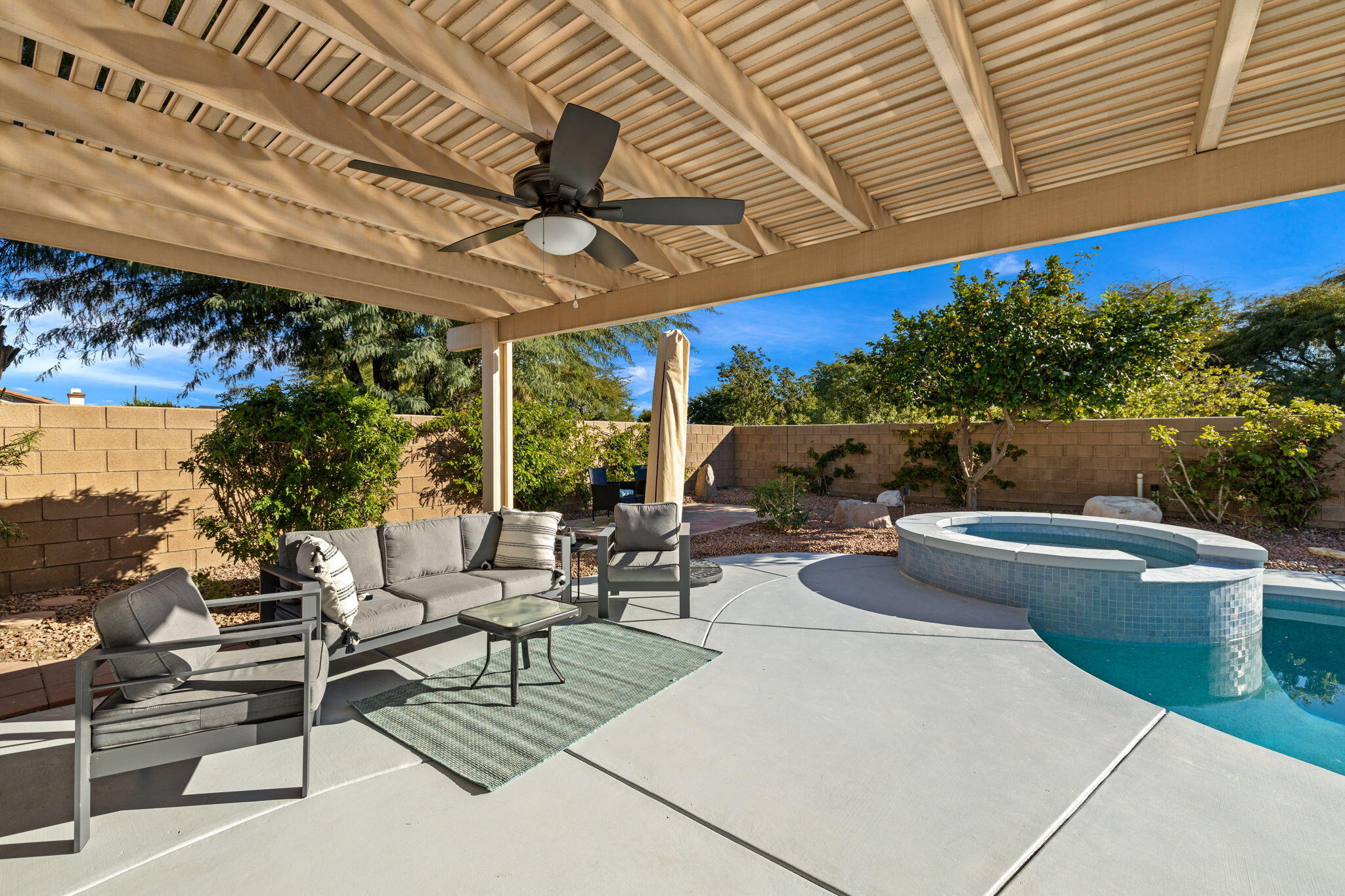 81107 Portola Circle Indio, CA 92201 - Photo 36 of 40 a view of a patio with couches and potted plants