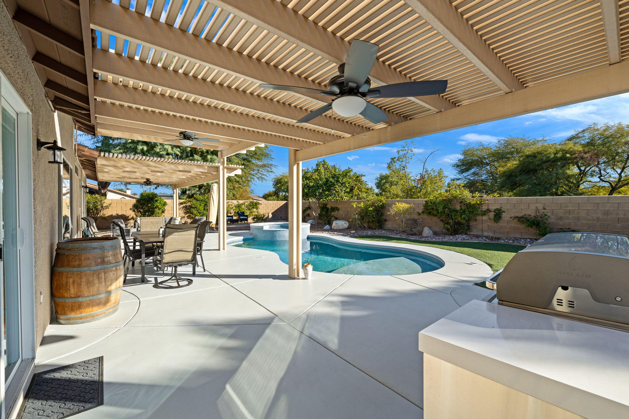 81107 Portola Circle Indio, CA 92201 - Photo 39 of 40 a view of a patio with table and chairs