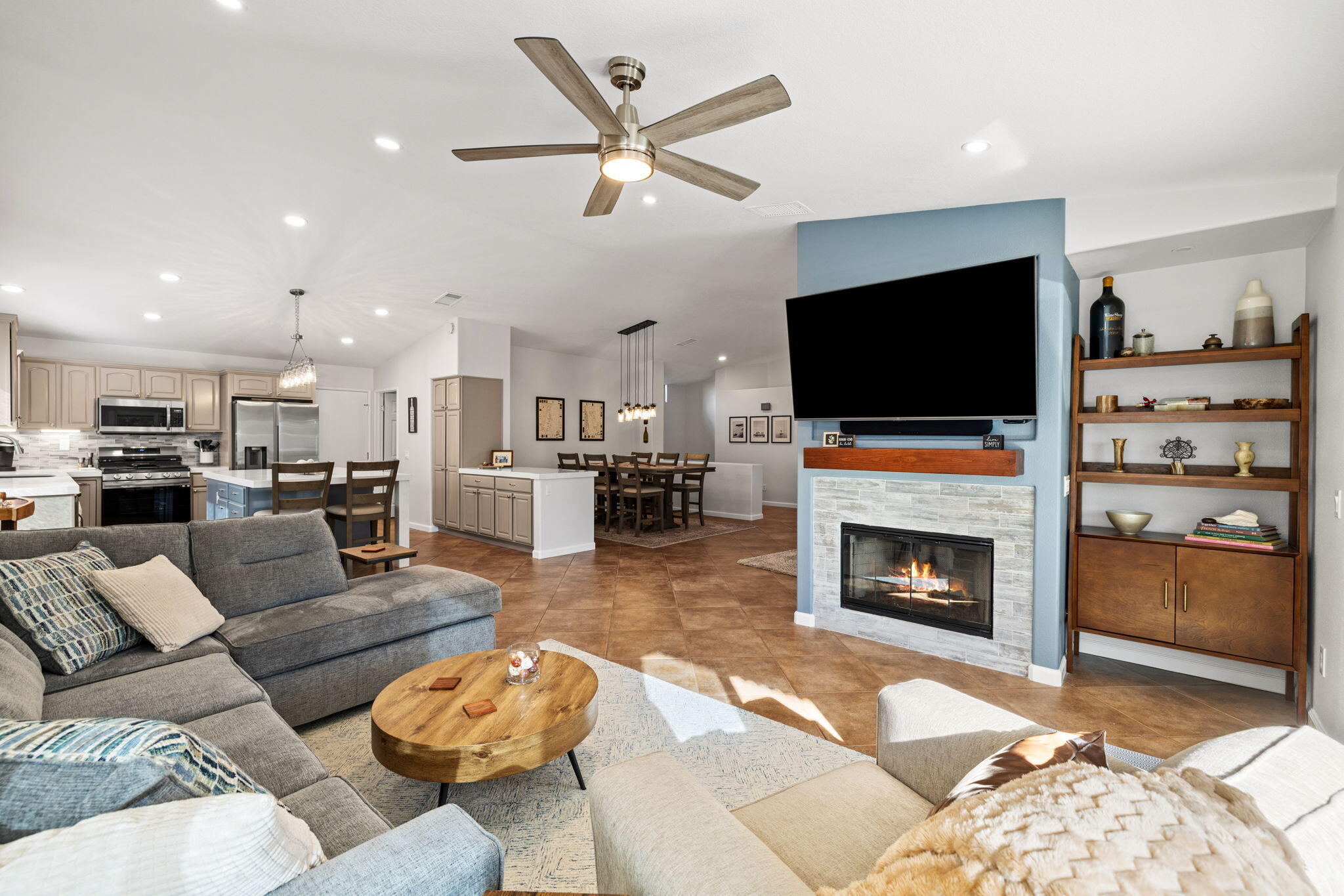 81107 Portola Circle Indio, CA 92201 - Photo 5 of 40 a living room with furniture and a fireplace
