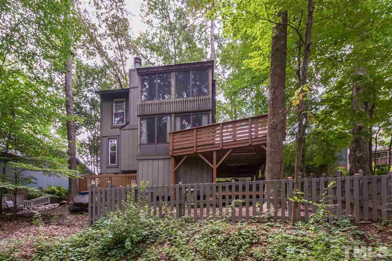 2733 Rue Sans Famille Raleigh, NC 27607 - Photo 24 of 25 a front view of a house with garden