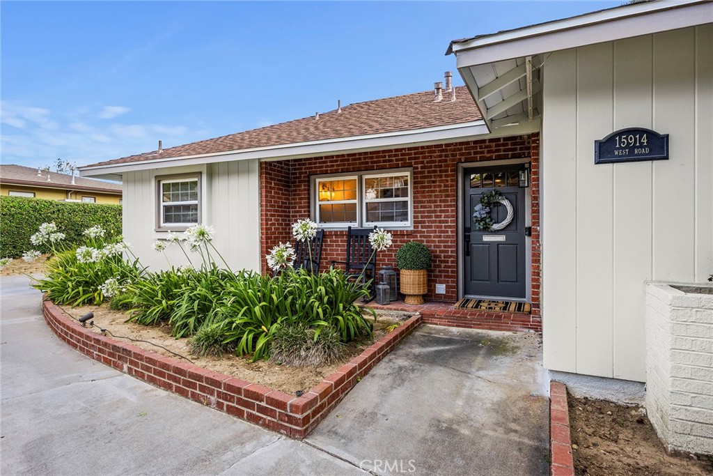 15914 West Road Whittier, CA 90603 - Photo 3 of 47 a front view of a house with garden
