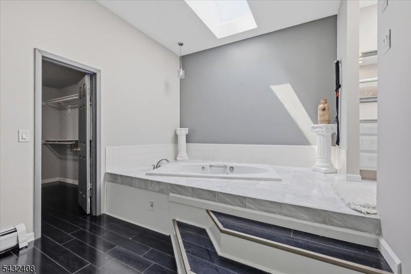 112 Knob Hill Road Hackettstown, NJ 07840 - Photo 22 of 32 a bathroom with a sink and a mirror