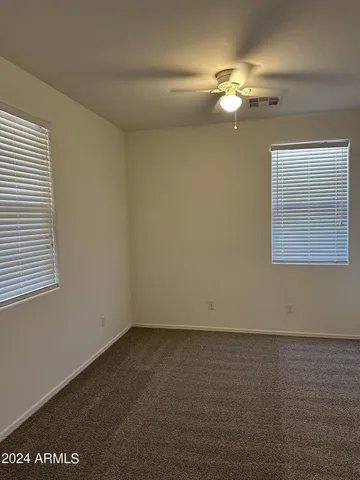 a view of a room with a fan