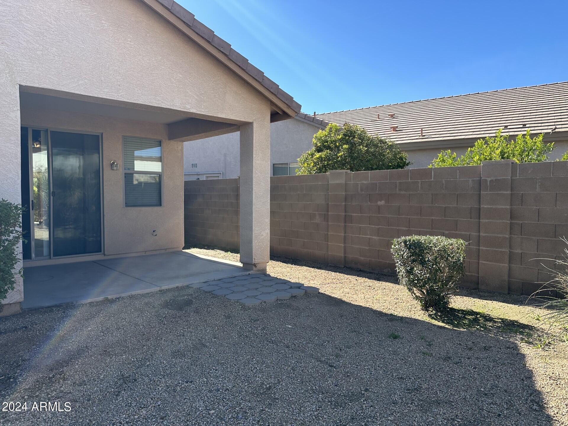 44456 West Eddie Way Maricopa, AZ 85138 - Photo 15 of 18 a view of a backyard