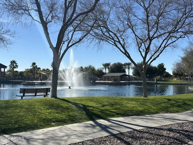 a view of lake with a yard