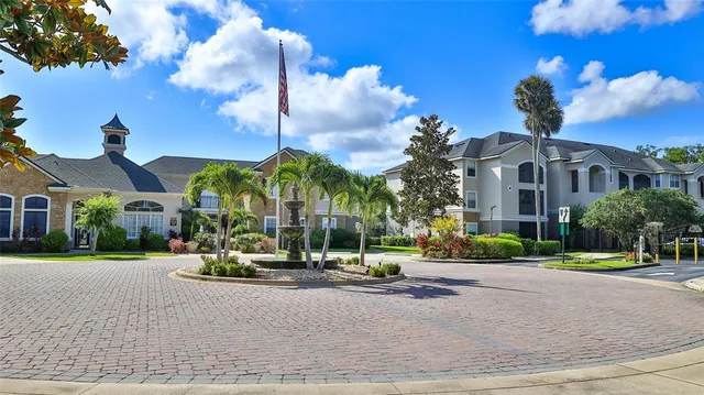 a view of a street with a building in the background