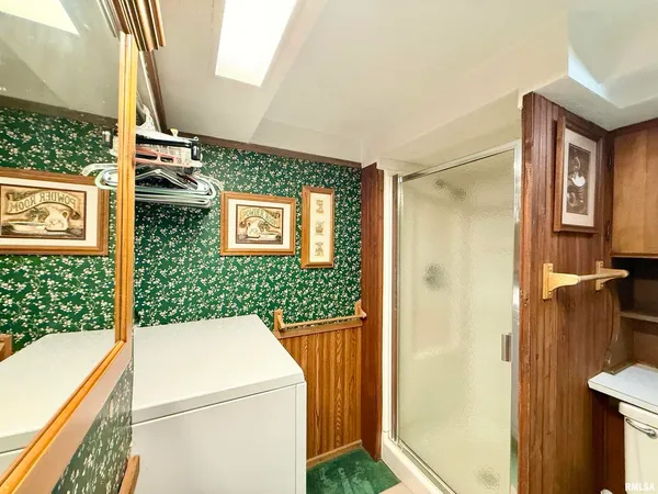 a view of a door and chair in the balcony