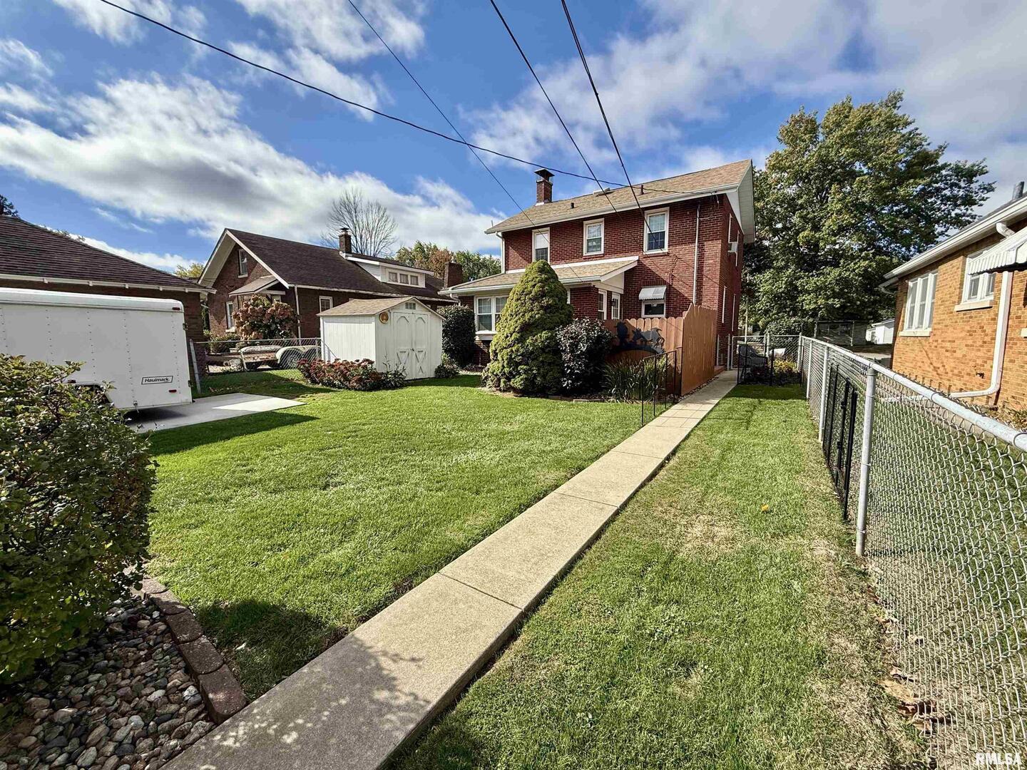 2340 7th Street East Moline, IL 61244 - Photo 26 of 26 a view of a yard in front of house
