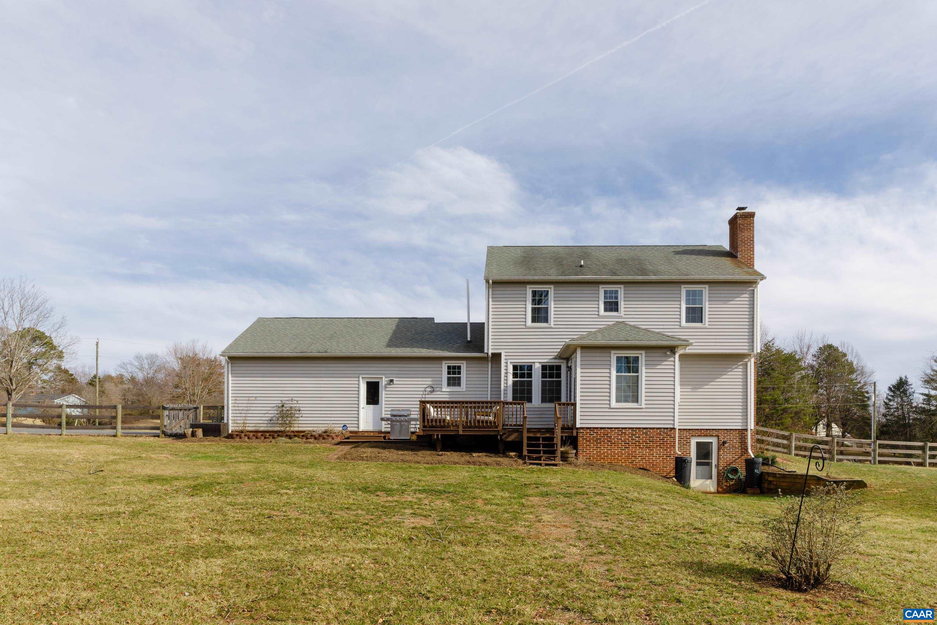 2706 Dunromin Road Charlottesville, VA 22901 - Photo 41 of 61 a front view of a house with a yard