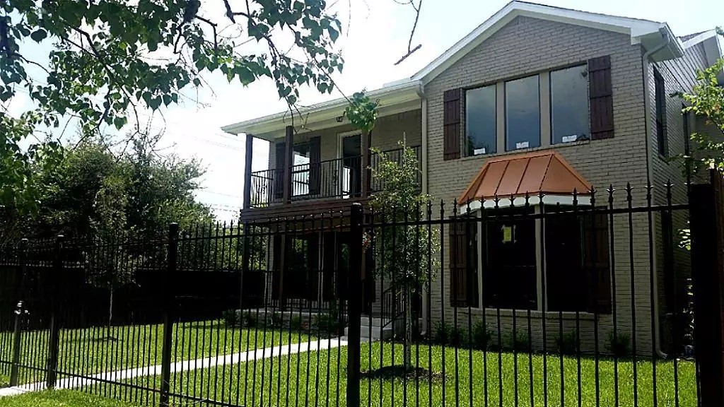 1452 Pearson Street Houston, TX 77023 - Photo 13 of 13 a front view of a house with a garden