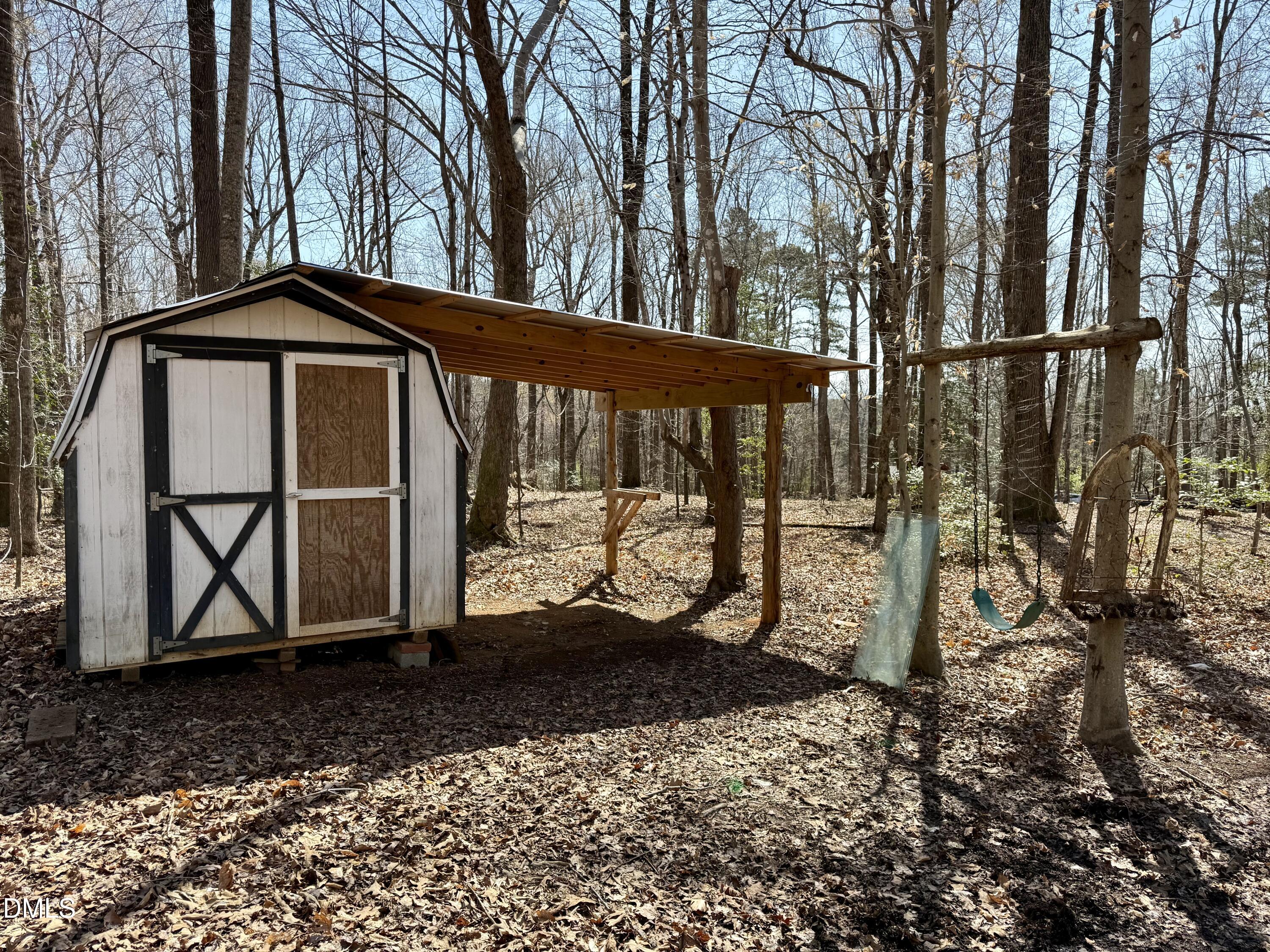 6450 Moores Mill Road Rougemont, NC 27572 - Photo 56 of 66 a view of a small house with a yard