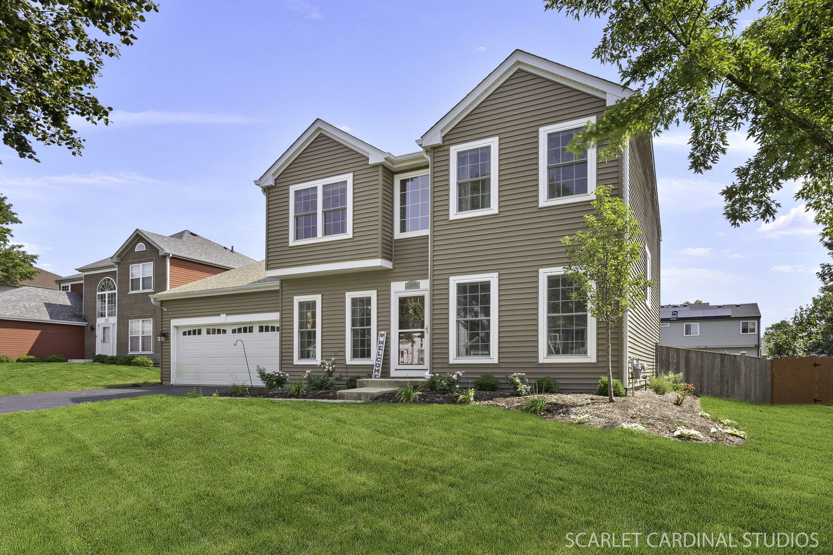 227 Faircroft Road Bartlett, IL 60103 - Photo 1 of 22 front view of a house with a yard