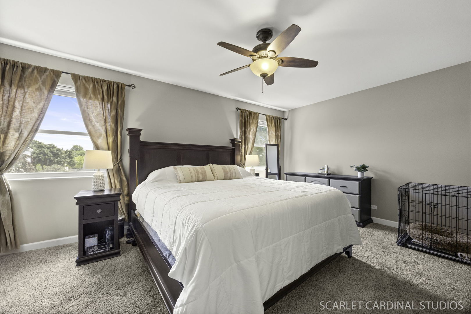 227 Faircroft Road Bartlett, IL 60103 - Photo 11 of 22 a bedroom with a bed and a chandelier