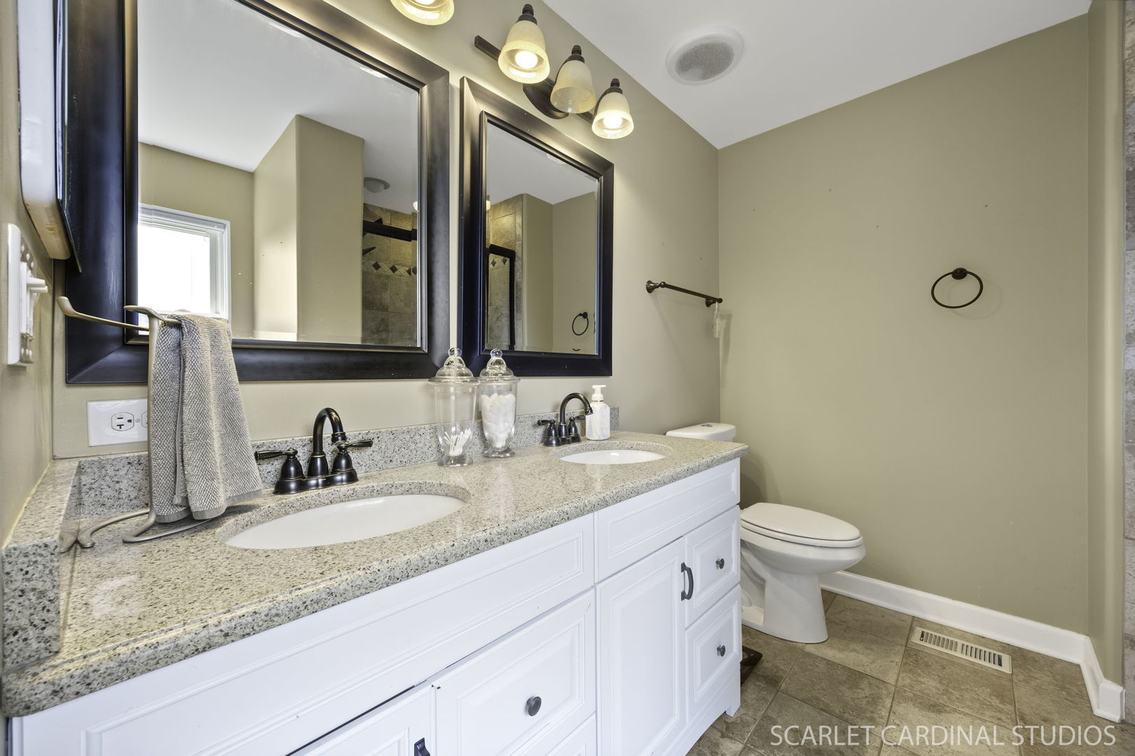 227 Faircroft Road Bartlett, IL 60103 - Photo 12 of 22 a bathroom with a granite countertop sink mirror vanity and toilet