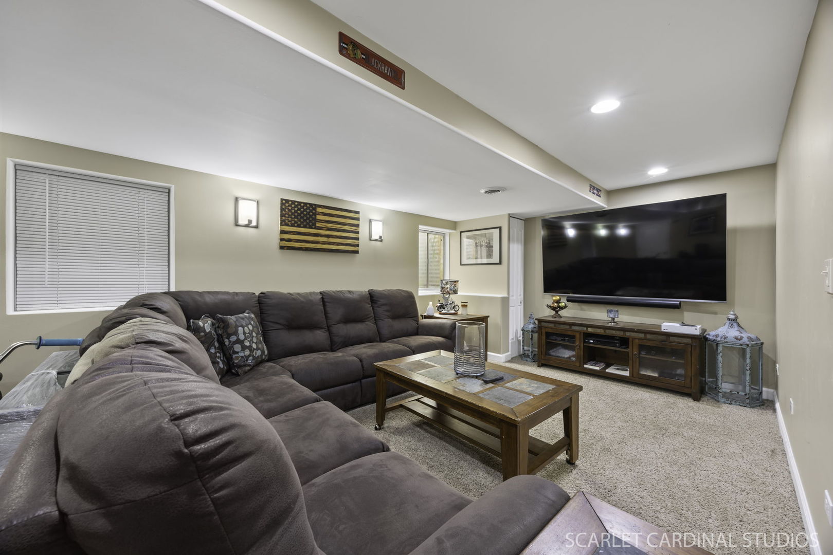227 Faircroft Road Bartlett, IL 60103 - Photo 18 of 22 a living room with furniture and a flat screen tv