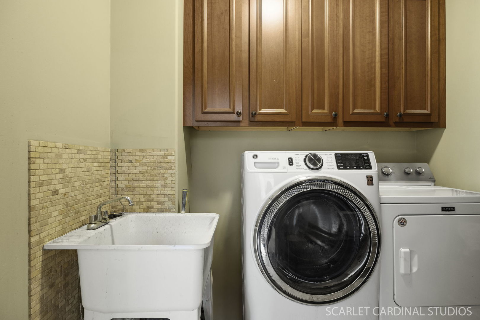 227 Faircroft Road Bartlett, IL 60103 - Photo 20 of 22 a utility room with dryer and washer
