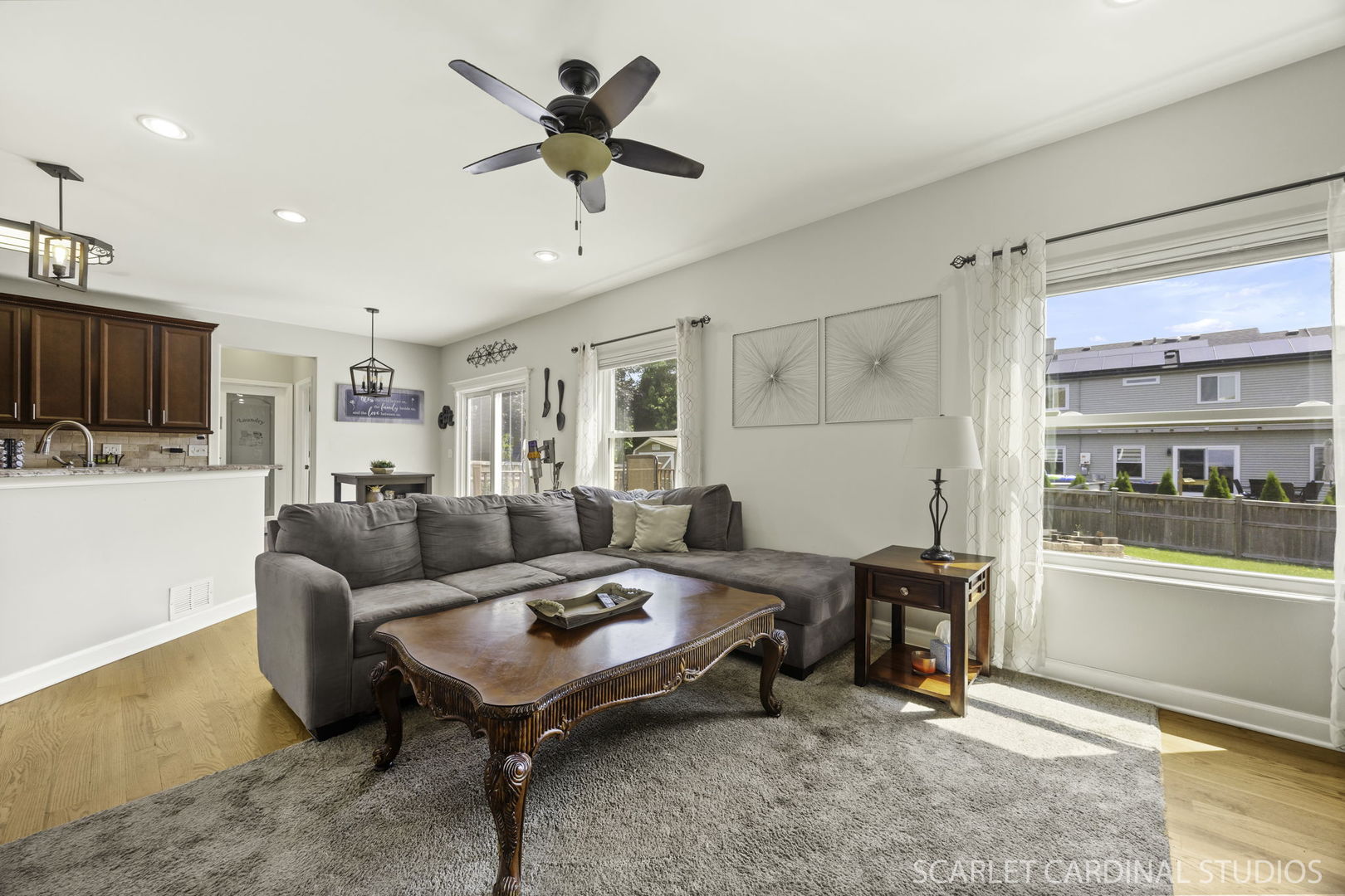 227 Faircroft Road Bartlett, IL 60103 - Photo 6 of 22 a living room with furniture and a kitchen view