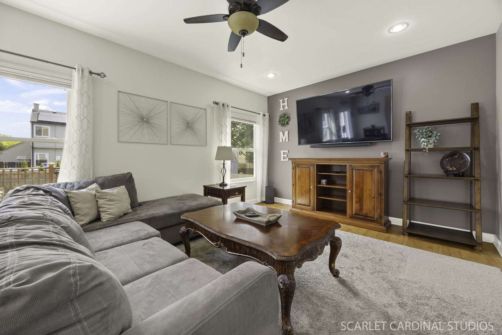 227 Faircroft Road Bartlett, IL 60103 - Photo 7 of 22 a living room with furniture and a fireplace