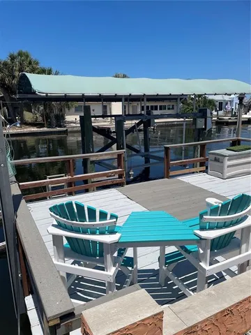 a view of a chairs and table on the terrace