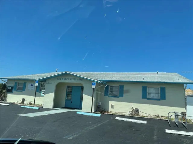 a front view of a house with a garage