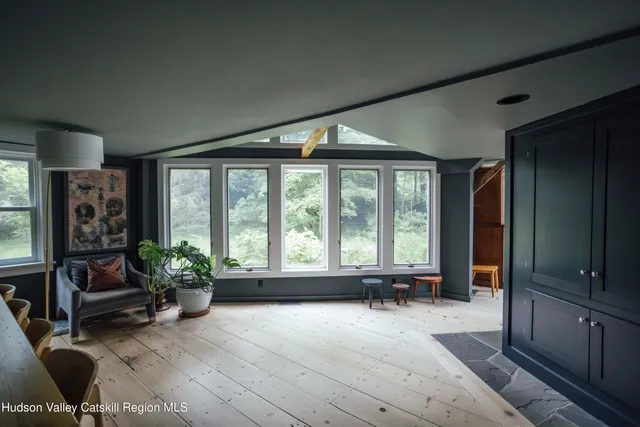 a room with furniture and window